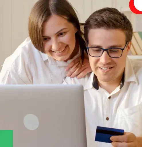 A man an a woman with a laptop